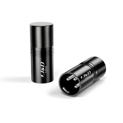 Two black cylindrical J&D 1200mAh portable power banks shown on a clean white background, one standing upright and the other lying on its side to display the plug openings.