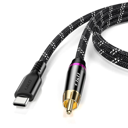 A braided black and white USB-C to RCA audio/video adapter cable on a clean white background, featuring a black USB-C connector, a gold-plated RCA connector, and a purple accent ring.